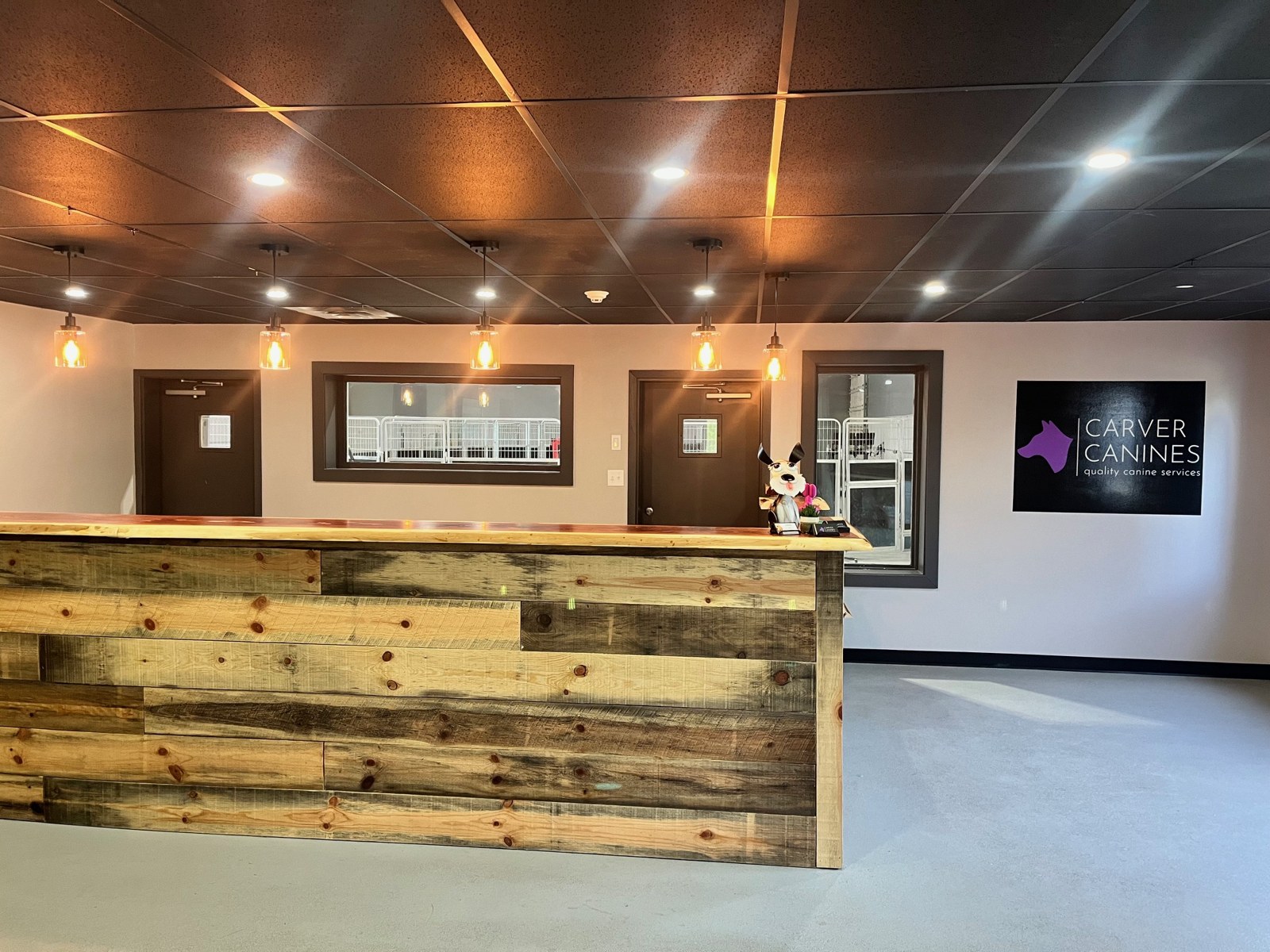 Front desk with Carver Canines logo